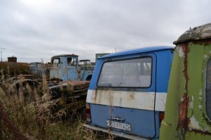 На двух фотках видны номера.
1. На первой, на той что подальше. Плохо, но видно.
2. На этой.