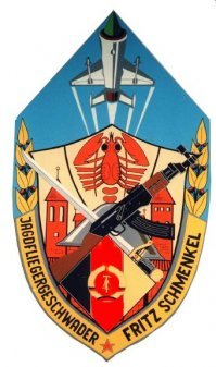 единственная истребительная эскадрилья ВВС ННА ГДР носила имя Ф.Шменкеля) 
Образована в сентябре 1952г., расформирована в сентябре 1990-го.
Машины:
1953-1956гг: 
Як-18, Як-11
с 1956 по расформирование:
МиГ-15УТИ, МиГ-17Ф, MиГ-17ПФ, MиГ-21У, MиГ-21СПС, MиГ-21СПС/K, MиГ-21УС, MиГ-21УМ, MиГ-21МФ
Штат: 494 человека (192 офицера, 277 унт.-оф./зольдата,  25 гражданских)
