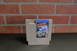 А вот игрушка, которую коллекционеры ищут днем с огнем - Blaster Master
Игрушка просто мега-шикарная, и как сама по себе - невероятно круто сделана для этой платформы, ну и +10 к уровню ностальджи и +30 к карме нашедшего картридж коллекционера среди сообщества таких же наших шизанутых =)

Как вариант - можно на Amazon'е купить для NES Американской, но так же нужен переходник разъема-интерфейса на Famicon Японский - который собсно оригинал нашего клона Денди
и якобы все будет работать, но лично не пробовал