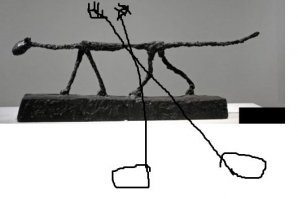 Это не скульптура, а обычная подставка под каминные щипчики. 
Шкварки ворочить