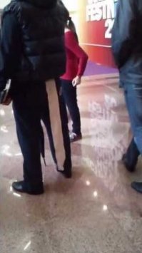 Ну а что такого-то? Человек работает на акции по продвижению какого-то товара. Люди подходят, пробуют...