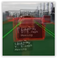 Над обьектом
L. Truck - легкий грузовик, Minivan ... 
ID - XX  (номер обьекта )

Снизу 
Lane - My (Полоса - Моя)
V (speed)  XX mph (скорость - ХХ миль час, разница скоростей относительно Теслы)
Moving (движется)

Другая картинка  - то же, но изменяется по мере приближения и обгона
L. Truck 
ID
Lane Right  - Полоса правая
V
Moving