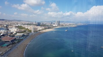 вид с работы на Барселону, порт и гору Montjuïc))) там и яхту Усманова видно