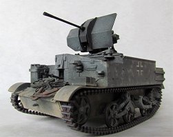 Суперская танкетка. Смотрел про неё передачу по дискавери, чего только с ней не делали во время войны изобретая ей различные модификации и назначения. Блоха войны :)
На фото несколько моделек сделанных по образу и подобию единичных экспериментальных экземпляров сумрачного тевтонского гения.