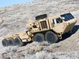 На мой взгляд Oshkosh M1075 выглядит итак брутально и довольно чётко без излишеств прекрасно (как впрочем почти вся военная техника). Мастерить на его шасси какой-то лимузин из ретро-фантастики 30-х годов с передком ЗиЛа и крышей из брезента - лютый абсурд и безвкусица. 
Ну это на мой взгляд. А так у арабов денег не считано и кто-то неплохо заработал изготавливая этот заказ :)