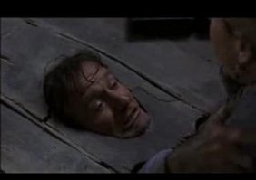 Не знаю объяснение коммента, но по фото всё очень просто: На крышу гаража, покрытую рубероидом положили капот и срезанную крышу автомобиля. С этого ракурса кажется, что автомобиль просочился сквозь крышу и часть его на улице. Мне сначало показалось, что это парковку так заасфальтировали вместе с машиной.