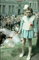 А то что девочка на 1 мая грустная,так она такая по жизни несмеяна.