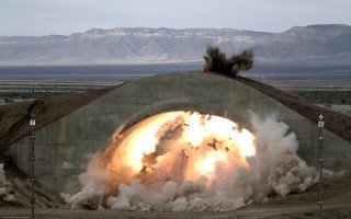 Многие пишут, что кто-то виноват в том - что эти базы пришли в запустение.. Это не политики и не военные виноваты и даже не гринписовцы. Виновато время и технический прогресс. Таких баз по бывшему союзу - великое множество. Просто по началу ракеты были большие, и чтоб их уберечь от уничтожения превентивным  ядерным ударом - их помешали в пусковые шахты, которые закрывались многотонными крышками (понятно что прямое попадание они не выдержат, но взрыв сродни хиросимскому, вполне, если до эпицентра будет около 1 км. Ну  это , опять таки, было актуально пока не научились делать водородные бомбы, которые сдували бы такие крышки как листву), а сами базы маскировали под обычные военные части, коих было понастроено после войны несколько десятков тысяч. И в те времена только Пауэрс на своём U-2 мог чёт там сфоткать, если погода была не облачная, а потом бы местные ЦРУ-ушники с линейками пытались бы определить: что там прячут эти коварные русские. Так и жили до тех пор пока не появились спутники с отличной оптикой и тепловизионным оборудованием, и ракеты которые вместо базирования шахтного, уже вполне себе умещались на колёсных платформах... Думаю всем понятно что содержать шахту для ракетного пуска и аналогичный Тополь-М на шасси колёсного тягача - очень разные вещи. Плюс очень быстрыми темпами развивалось высокоточное оружие, и стало понятно что только наличие мобильных комплексов дают шанс нанести ответный удар, так как все стационарные ракеты в шахтах будут решительно уничтожены сразу после перехода конфликта в горячую стадию (важно что даже не обязательно ядерным ударом, а обычными сверхточными боеприпасами которые детанируют на заглублении, против бункеров специальные). Поэтому ракеты сейчас несут своё боевое дежурство на кораблях, подводных лодках, колёсных шасси. А ракетные базы практически полностью выведены из эксплуатации либо перепрофилированны. Это очень сильно облегчает нагрузку на экономику, когда вместо сотен ракетных баз, у нас сотни мобильных платформ, которые требуют куда более меньший гарнизон и кардинально менее затратны в вопросе эксплуатации.
Так что это просто пережиток прошлого, а точнее  холодной войны, и в том что такие объекты в заброшенном состоянии - нет ничего удивительного. Они просто устарели и стали абсолютно ненужными. Повторюсь, такая заброшка есть по всей территории бывшего СССР, а не только у наших украинских братьев.