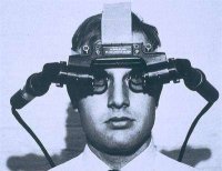 1968 г. первый шлем виртуальной реальности

 1994 год VR-шлем ориентированный на массовое пользование: VFX1.

 1995 год Virtual I/O выпустила очки виртуальной реальности. I-Glasses предполагалось использовать в создании домашней развлекательной системы   очки подключались ко множеству устройств, будь то компьютер, телевизор, или видеомагнитофон. Это было стильное и легкое (~300 грамм) 

 1997 год Sony выпустила Glasstron

Чем не очки из фильма?