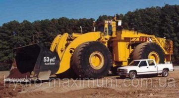Этот фронтальный погрузчик LeTourneau L-2350 берет на борт 40,5 м.куб. При удельном весе 1,5 это почти 61 тн.