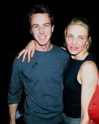 Что-то у нее рот какой-то красрый, намятый....