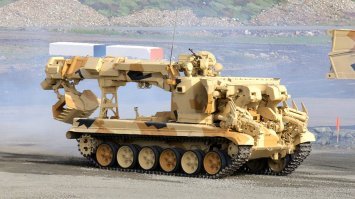 Ну вообще-то для долго пребывания в высоких полях, от этого транспорта толку особо не было, никто не будет заезжать в такие поля без острой необходимости. А чаще всего  это острая необходимость диктовалась какими-то работами в опасной зоне, для  этих целей используют ИМР. А вот для штабистов, и командиров, которым надо подъехать быстро посмотреть и уехать (или произвести разведку), вполне себе в том же Чернобыле использовались БРДМ-2РХ (модифицированные как кустарно, так и заводским способом). Либо РХМ на базе бронетранспортёра. Потому что лучшая защита от радиации - временем и расстоянием, и если не надо ползать по болотам, и завалам, то у Ладоги нет явных преимуществ перед ИМР, а по мобильности она явно уступает колёсной технике, вот и отправили её пылится в ангары.