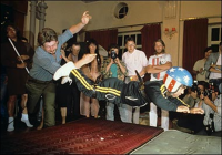 Древний или нет , но весьма странный вид спорта :
Метание карликов .