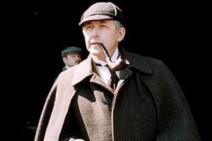 Скорей на Холмса, Ливанова. Фотку в полный рост с палкой не нашел. Но поза - да.