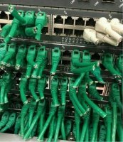 Такая проблема переобжать три десятка концов витой пары? Там работы на час-два от силы, даже если подсети раскиданы по портам...