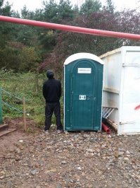 не знаю как обстоят дела с "биотуалетом" на фото, но, те что я видел у нас-лучше поступить как этот парень!!!