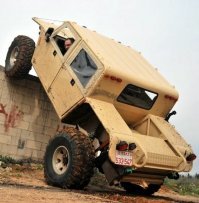 Это не Хаммер, это израильский ZIBAR MK2...

"Израиль спроектировал и построил уникальную внедорожную автомобильную платформу ZIBAR MK2, призванную удовлетворить многие аспекты оперативных потребностей специальных антитеррористических подразделений.

ZIBAR MK2 обладает внушительными характеристиками внедорожника, оснащен 620-и сильным двигателем V8, надежной автоматической коробкой передач и позволяет преодолевать чрезвычайно сложный ландшафт.

ZIBAR MK2 был испытан в условиях пустыни по всему миру при рабочей температуре до 55 градусов Цельсия. Также был испытан на песчаных дюнах, каменистых тропах, болотах и водных преградах.

ZIBAR MK2 обеспечивает высокую функциональность, мобильность и живучесть, предоставляя тактическим подразделениям и силам специального назначения возможность быстрого развертывания и высокой маневренности.

ZIBAR MK2 представляет из себя гибкую платформу, которая может быть легко и быстро адаптирована с учетом особых потребностей конкретного клиента, сохраняя при этом свою гибкость для быстро меняющимся требований и ситуаций.

Паспортные данные

Двигатель 7.2 бензиновый (500 л.с.)
Автоматическая коробка передач
Полный привод
Машина 2012 года выпуска, была куплена в 2015 году" (с)