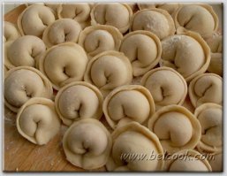 Это не пельмени. Это мясо в тесте.
Вот пельмени:
