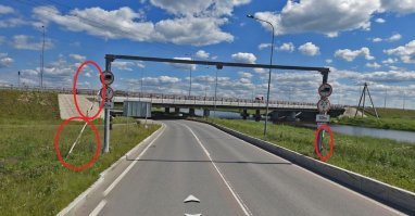 С "Мостом глупости" не все так просто.
Там и ограничители стоят (их сносят по нескольку раз в месяц) и знаки (несколько) и плакат висит.
Со стороны въезда он выглядит вот так: