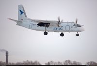 Судя по кабине это Ан-24