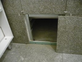 Как вариант "ревизия", - под проводку, трубы, чтобы четыре плитки не ковырять.