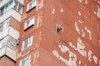 А труба буржуйки выходящая с балкона многоэтажного дома - это, вроде как, норма?)))