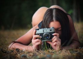 Человек с фотоаппаратом