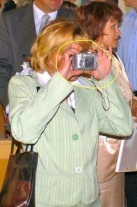 Человек с фотоаппаратом