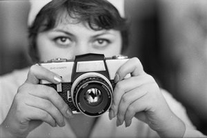 Человек с фотоаппаратом