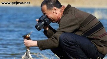 Человек с фотоаппаратом
