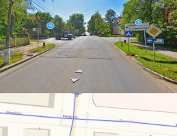 Накосячил водитель ларгуса. 
Он ехал по главной, как и девушка на гужевой повозке, но при повороте налево должен был пропустить весь встречный транспорт.