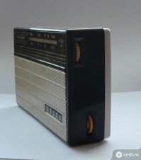 Дома была Selga. С аккумулятором и зарядным устройством, как на фото. Чехол был кожаный, коричневый, как на втором фото. А сам приёмник был как на 3-м и 4-м фото. 
Правда, на моей памяти она уже была нерабочей. Пытался реанимировать, но в силу малых лет попытка успехом не увенчалась.