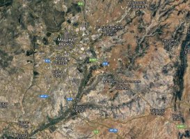 Прочитай внимательно - они в Мадриде проживали, а не землянку там вырыли.
Посмотри на карту - в Испании куча гор. Причём их много и в окрестностях Мадрида. А в горах снег.