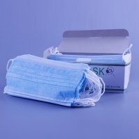 Вот маски как упакованы. У них, походу, использованные из туалета бумажки...