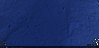 Если поковыряться в этом приложении, то относительно недалеко от указанных координат, в Карибском море можно и не такое разглядеть.