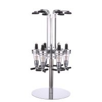 Вот современный вариант. Бутылки крепятся горлышком вниз, шкафчик закрывается а снизу просто подносится тара (бокал, рюмка, стакан), наживается клапан и алкоголь порционно наливается. Соль в том, что именно порционно и нет необходимости каждый раз откупоривать и закупоривать бутылку.