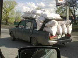 Хм... Хотите сказать, что вот так лучше? 
А что, багажник "заводской", за разрешенный габарит, груз не выступает...