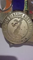 У дочери медалька есть за bjj. Лично Арнольд вручал. Хорошего фото с легендой нет. Даже близко подойти нельзя. Качки затопчут.