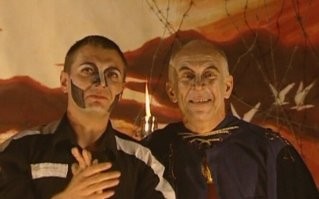 Он в зоновской самодеятельности будет участвовать, а не рукавицы шить... ))