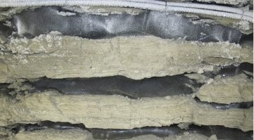 Тут не упомянули музей вечной мерзлоты в Игарке.
Был там в 91 году.  Ниже фотка, слой грунта, слой льда.