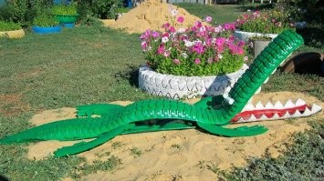 С какой скоростью крокодил может двигаться на суше и воде?