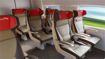 Похоже, это специальный экскурсионный состав. Интерьеры скоростного поезда выглядят иначе.