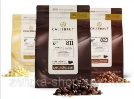 Европейцы едят чёрный шоколад в основном, американцы молочный. А там сахара дай бог каждому. 

Шоколад делают из переработанный какао-бобов, то есть в разных пропорциях какао-масло, какао масса, какао-порошок.
В хорошем чёрном шоколаде сахар будет на второй позиции и больше ничего, максимум вкусовые добавки (например с перцем и клубникой) 
В молочном основная часть это сахар и он всегда на первой позиции. 
Молочные жиры только в молочном и белом шоколаде.  
А самый лучший шоколад всегда был бельгийский и швейцарский.
Один из крупнейших поставщиков это барри коллебаут. На нем работают все самые именитые шоколатье и люксовые марки. И в Америке тоже. 

"Barry Callebaut (рус. Барри-Кальбо)   швейцарская компания, один из лидеров мирового рынка шоколада. Штаб-квартира   в Цюрихе."