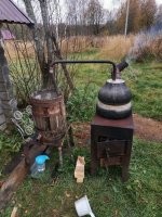 кто знает , что это за конструкция на печке?