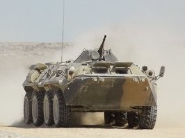 В 90-х видел у нас в Севастополе, как в банк (видимо за зарплатой) приехали из бригады морской пехоты ЧФ.
К банку на Ленина (центр города) подкатил БТР-80, вылезла пара морпехов с автоматами, затем женщина с портфелем. Морпехи ее до входа проводили и остались ждать.
Так что почти инкасаторский автомобиль был такой