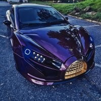 Думаю - где я уже видел эту решетку в виде мечети. Покопался - вот она родная, 2018 год, только дверей ливанцам, видимо, 4-х не надо 
"Французская компания MPM Motors разработала и построила прототип электрической версии своего спорткара Erelis. Напомним, что Erelis   это копия российской Tagaz Aquila, MPM Motors производит ее на своем заводе под Парижем.
На создание электромобиля ушел всего месяц. Вместо ДВС под капот установили электромотор мощностью 136 л.с., который питает батарея емкостью 42 кВт*ч."