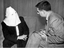 Первое что пришло в голову - собеседование ку-клукс-клановца ))