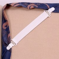 Чудесная вещь - фиксаторы для простыней. Рекомендую! Только берите с металлическими зажимами.