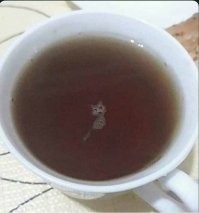 А у меня в кофе - котик.