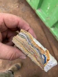 Эту краску назвали "фордит". Её гранят, полируют и впаривают как украшения. И не очень дёшево, кстати.